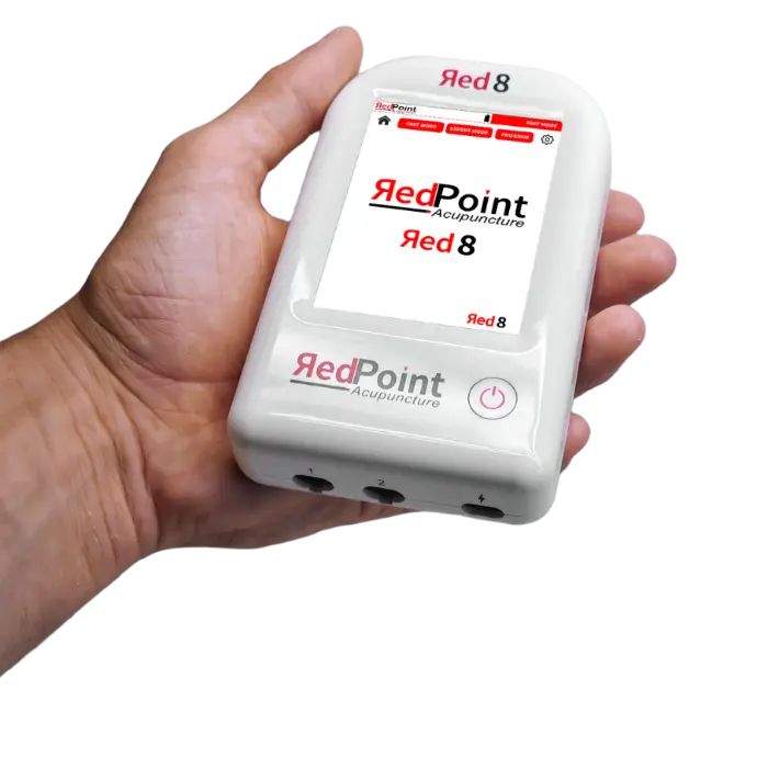 Illustration de l&#39;appareil Red 8 de RedPoint Acupuncture tenu dans une main de practicien, dispositif portable LED rouge pour la stimulation de 8 points d’acupuncture.